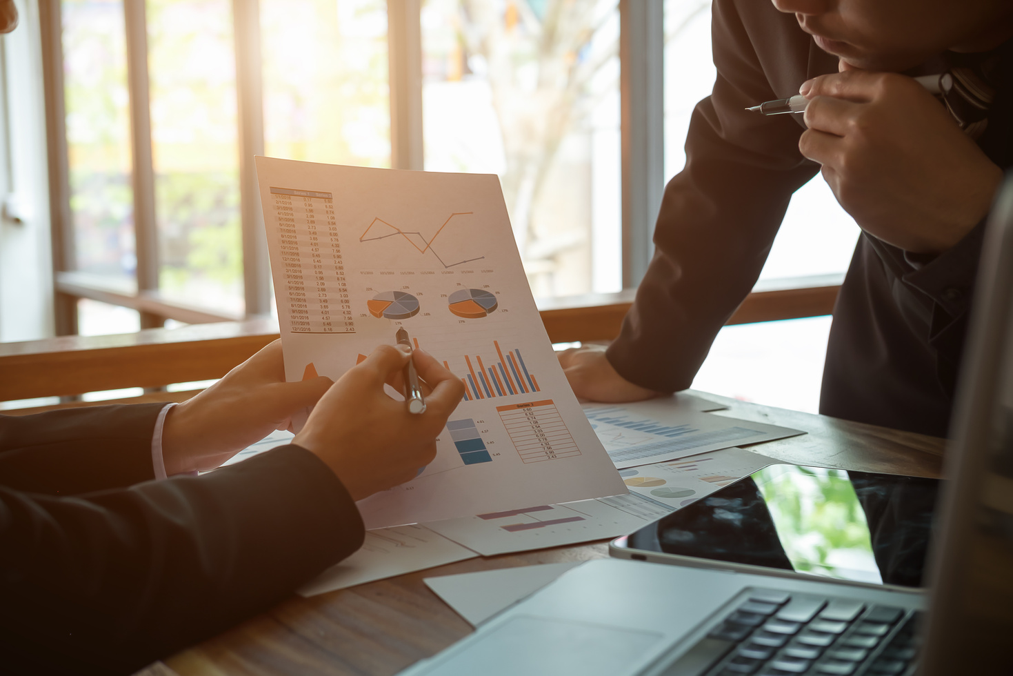 Businesspeople Analyzing Data